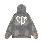 Denim jacket with 'CL' logo on the back against a white background